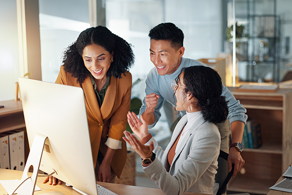 Three coworker working in an office