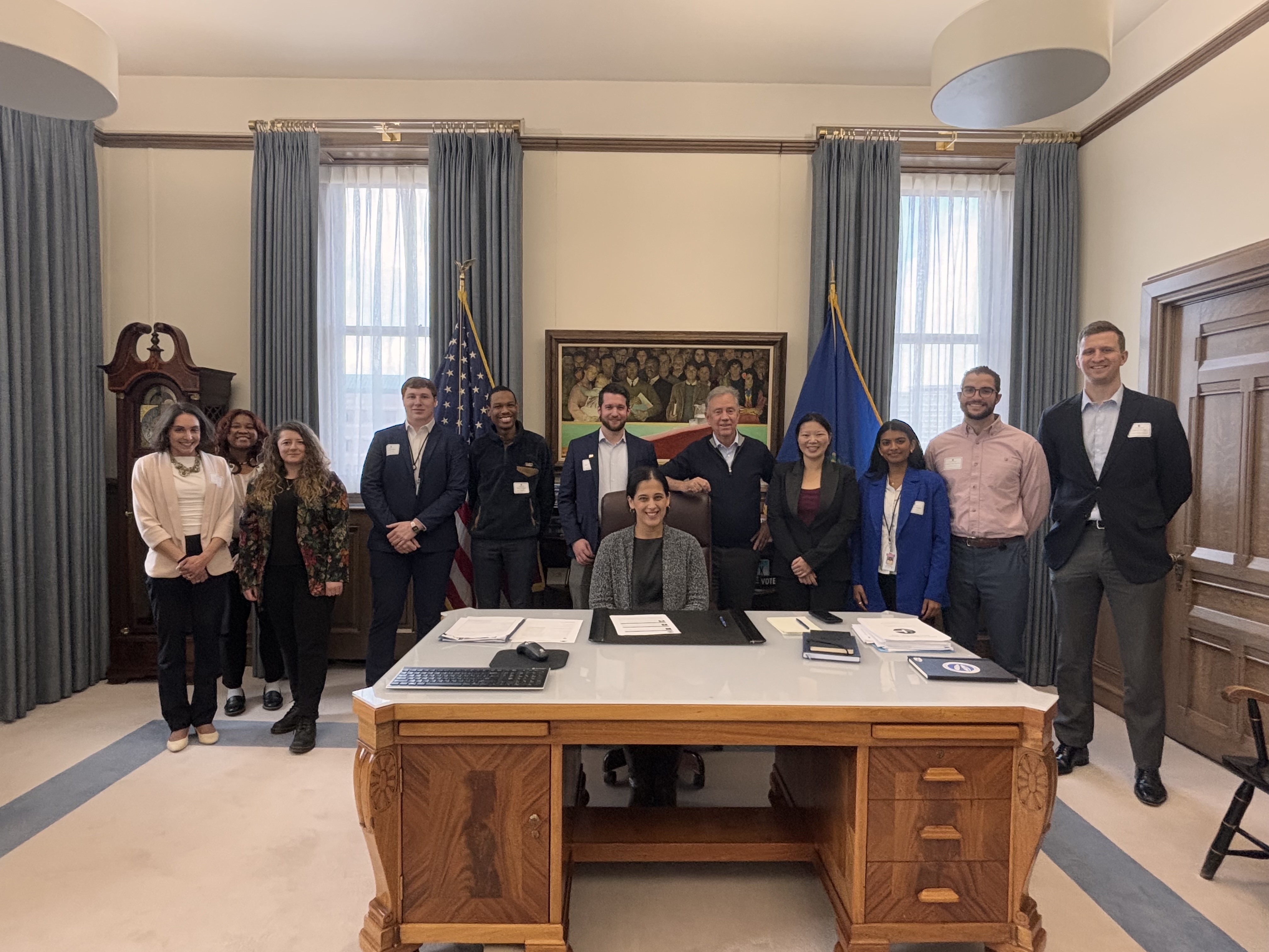 Picture of governor's fellows with Governor Lamont in his office