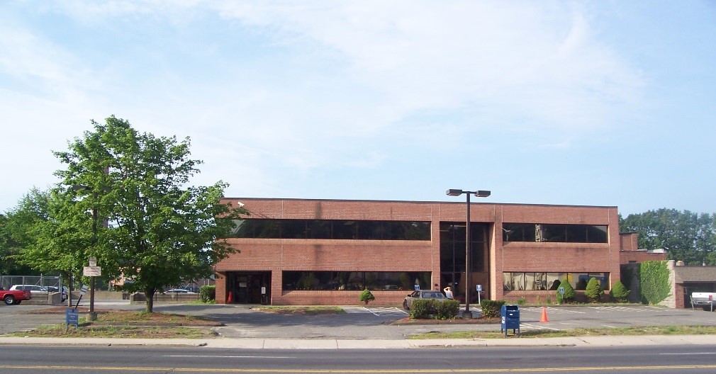 The exterior of a brick office building