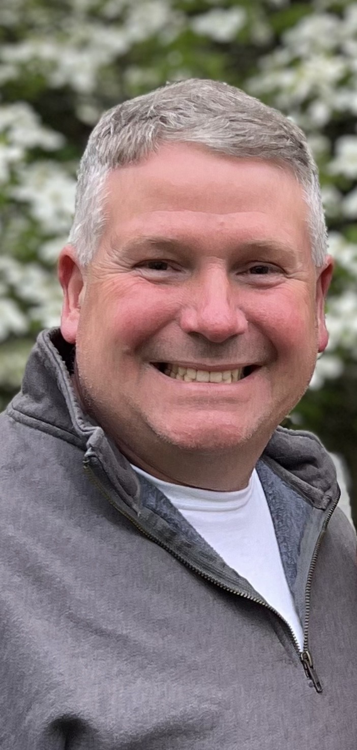 A portrait of David Woods