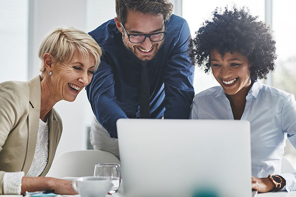 three people with laptop computer