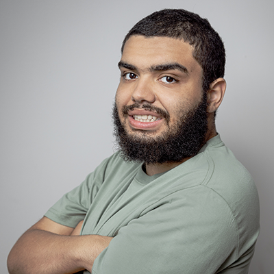 a teenaged boy smiles