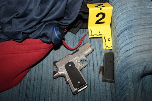 The firearm possessed by Edward R. Gendron, Jr., referenced by Officer Tompkins and Ms. Minicucci.