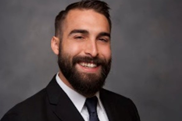 Professional headshot of Cody Venzke