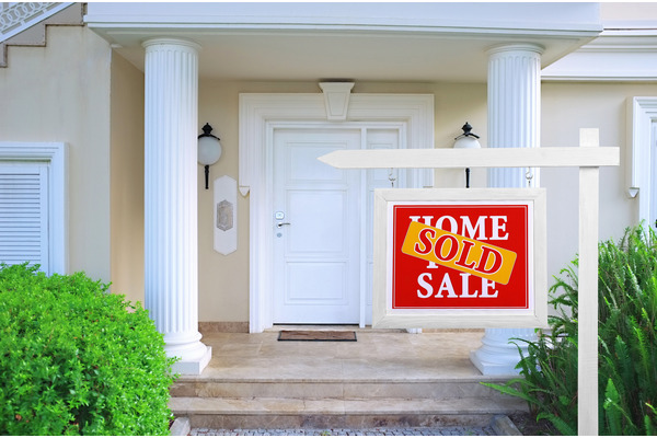 Image of house with for sale sign