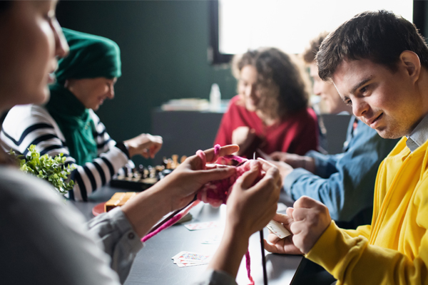 People sitting around a table with activities 