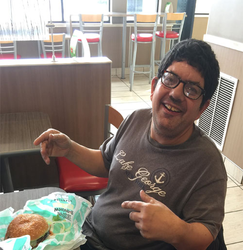 Doug Novitski with his hamburger