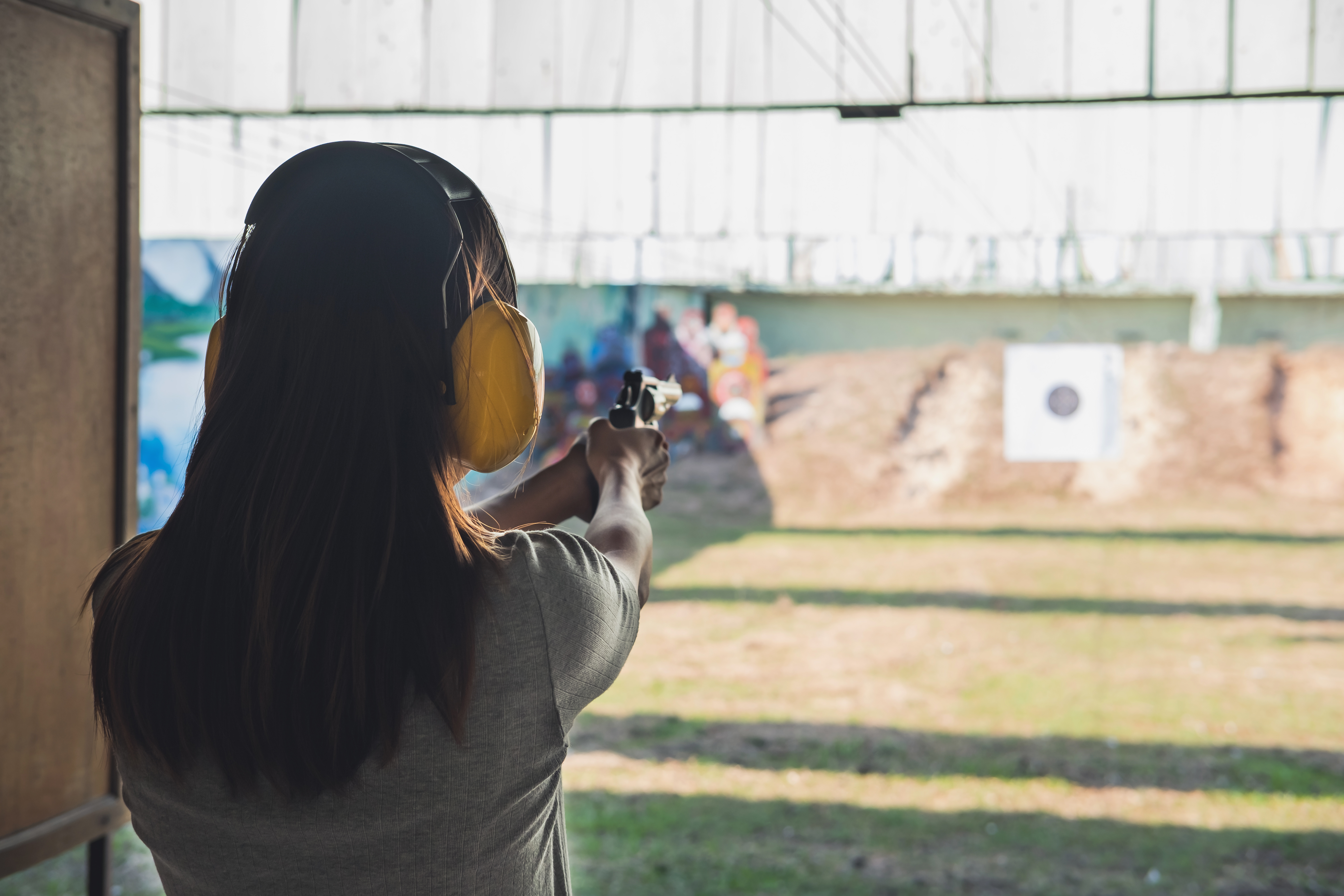 Woman at gun range