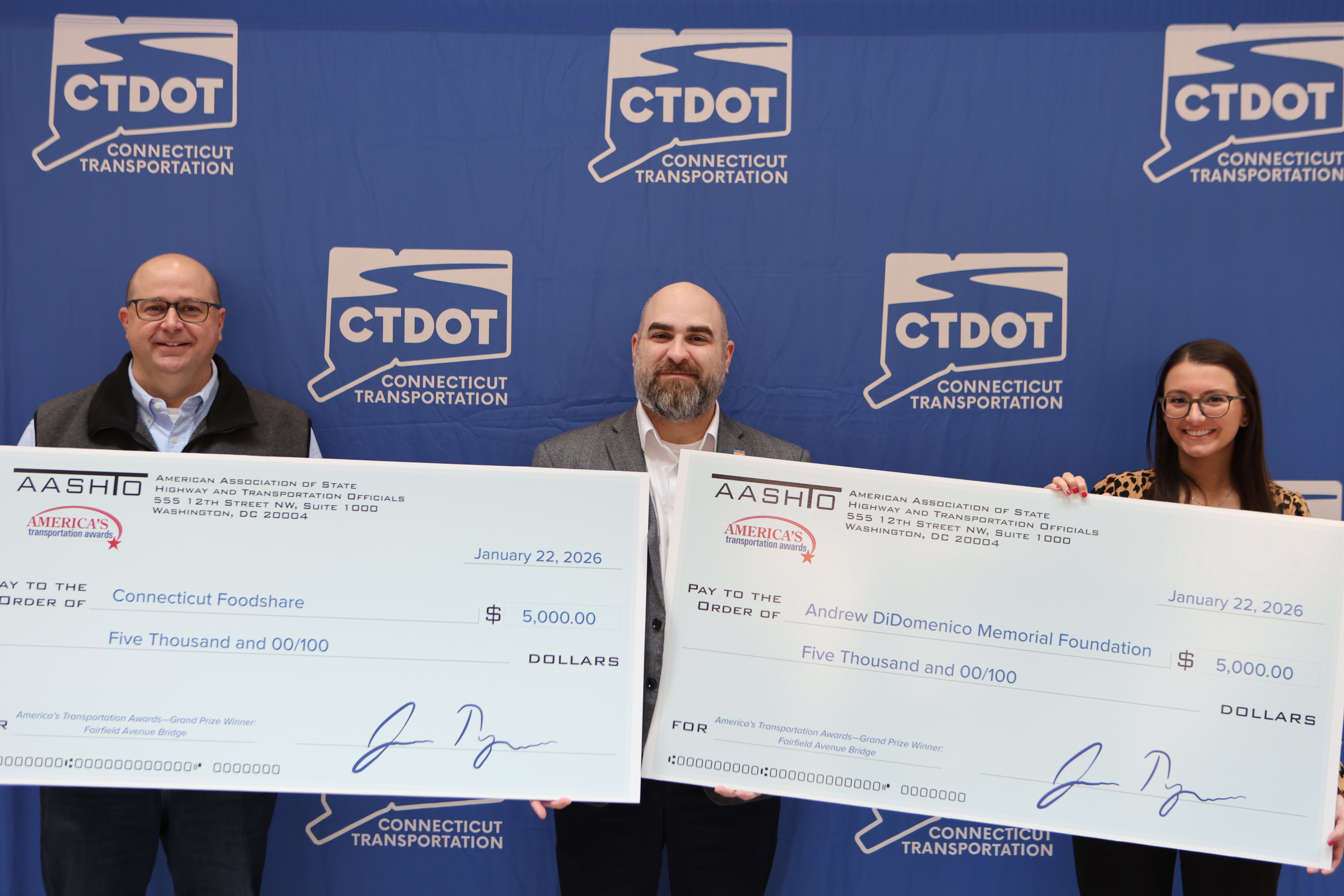 Jason Jakubowski, President and CEO of Connecticut Foodshare, CTDOT Commissioner Garrett Eucalitto, Vincenza DiDomenico, hold Grand Prize award. 