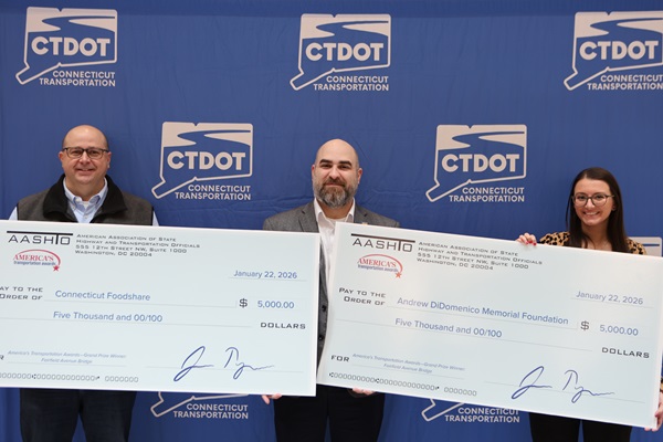 Jason Jakubowski, President and CEO of Connecticut Foodshare, CTDOT Commissioner Garrett Eucalitto, Vincenza DiDomenico, hold Grand Prize award.