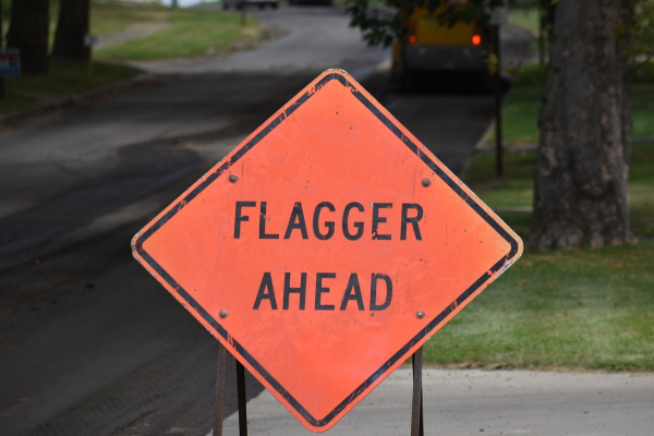 road work sign that says "flagger ahead"