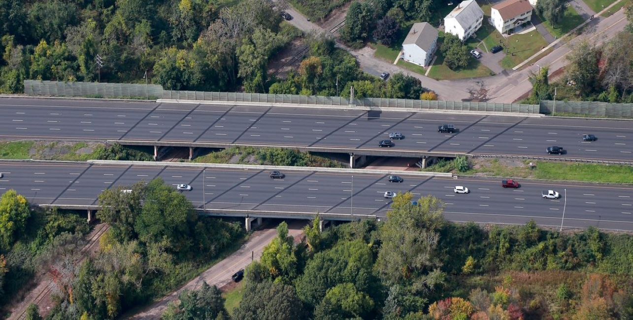 Wood sound barrier along highway