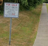 Picture of Bid Sign and Property