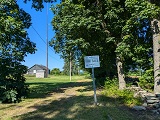 Picture of bid sign and radio tower