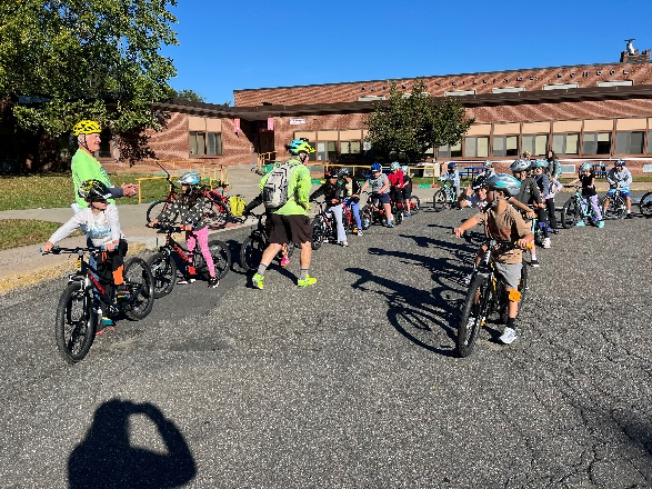 Children and adults on bicycles