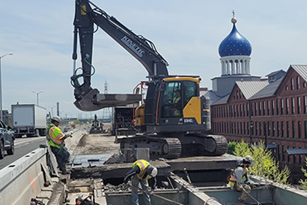 Crews demolishing the right lane of I-91 SB in Hartford.