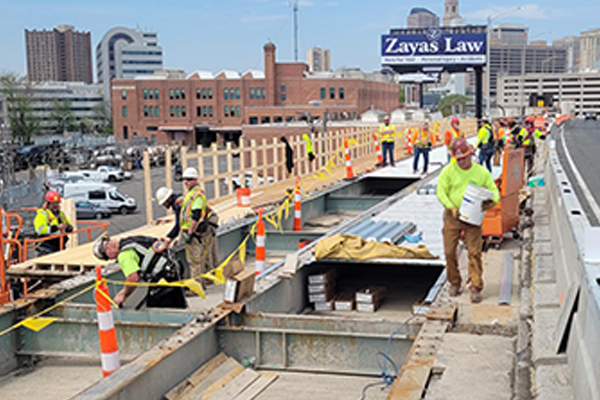 Crews construction the new I-91SB bridge deck.