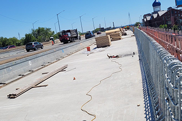 New concrete bridge deck on I-91 SB with parapet rebar on right ready for concrete.