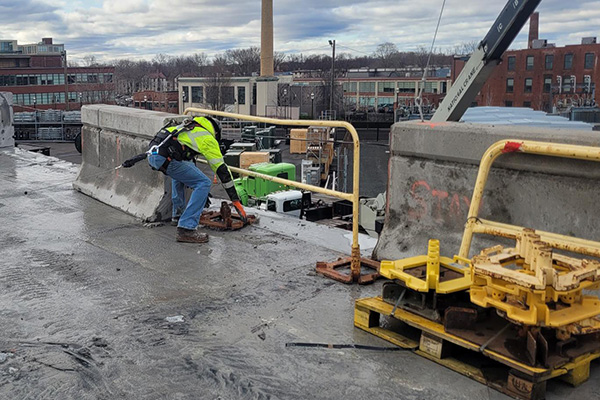 Concrete bridge parapet (barrier) removal