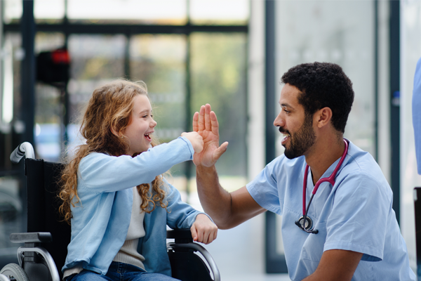 doctor having fun with little girl