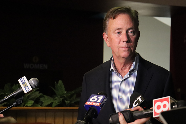 Governor Lamont answering questions about Policies from the Press.