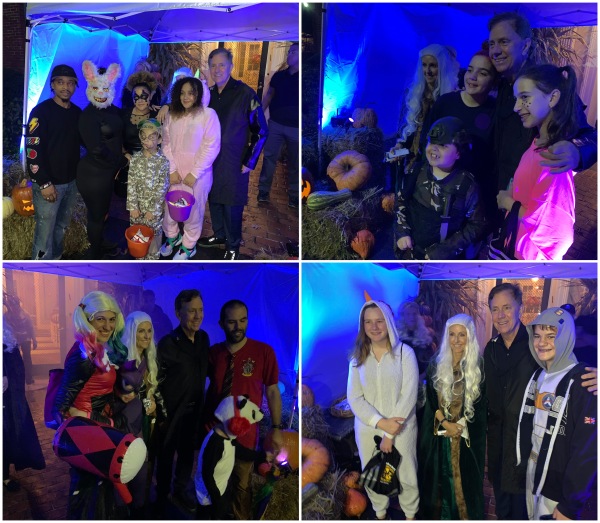 Governor Ned Lamont and First Lady Annie Lamont hand out candy to trick-or-treaters at the Governor's Residence in Hartford on Halloween.