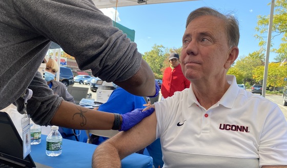 Governor Lamont receiving the bivalent COVID-19 booster