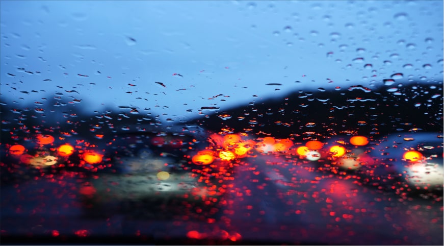 rainy day image from inside of a car - crash course nhtsa