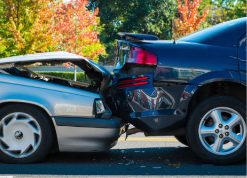 rear end crash between two cars - driving high penalties