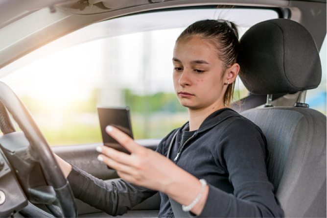 Women using phone while driving