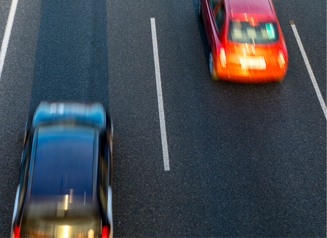 2 car in motion in a highway - left lane restriction laws