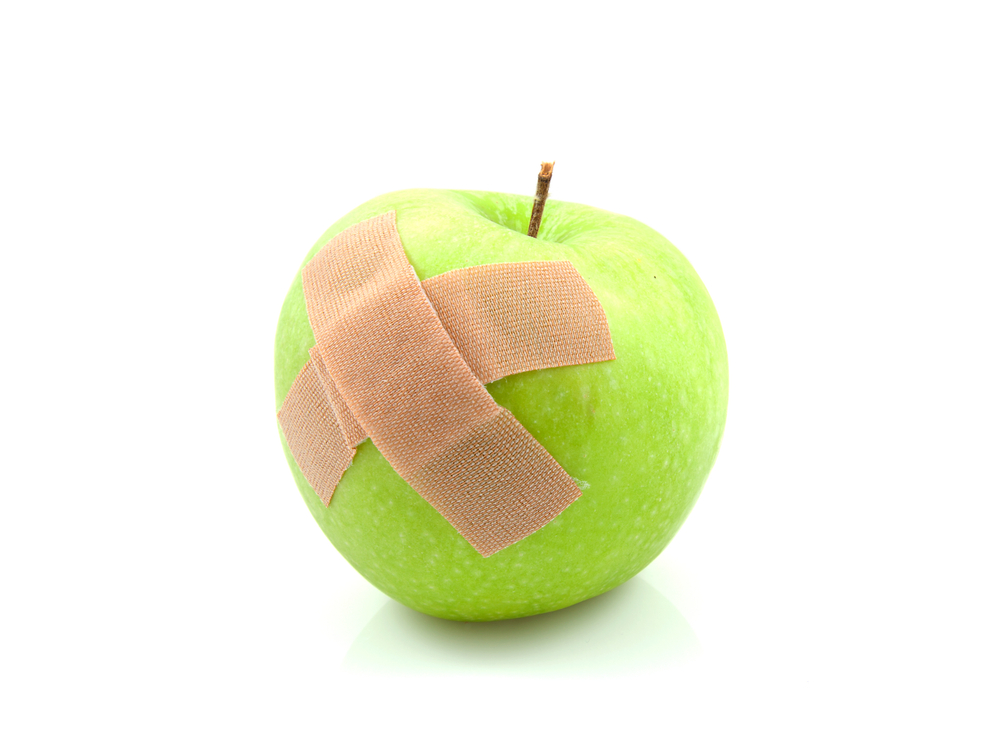 Apple with bandaid