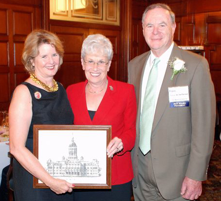 Lt. Governor Nancy Wyman presenting her gift to Kathy and Jim Heffernan