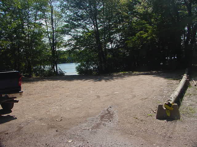 The parking area for the Middle Bolton Lake boat launch.