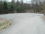 The parking area for the Quinebaug Pond boat launch.
