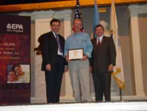 Foodshare staffer Steve Slipinsky accepts award from US EPA.