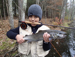 image of a child with a caught fish