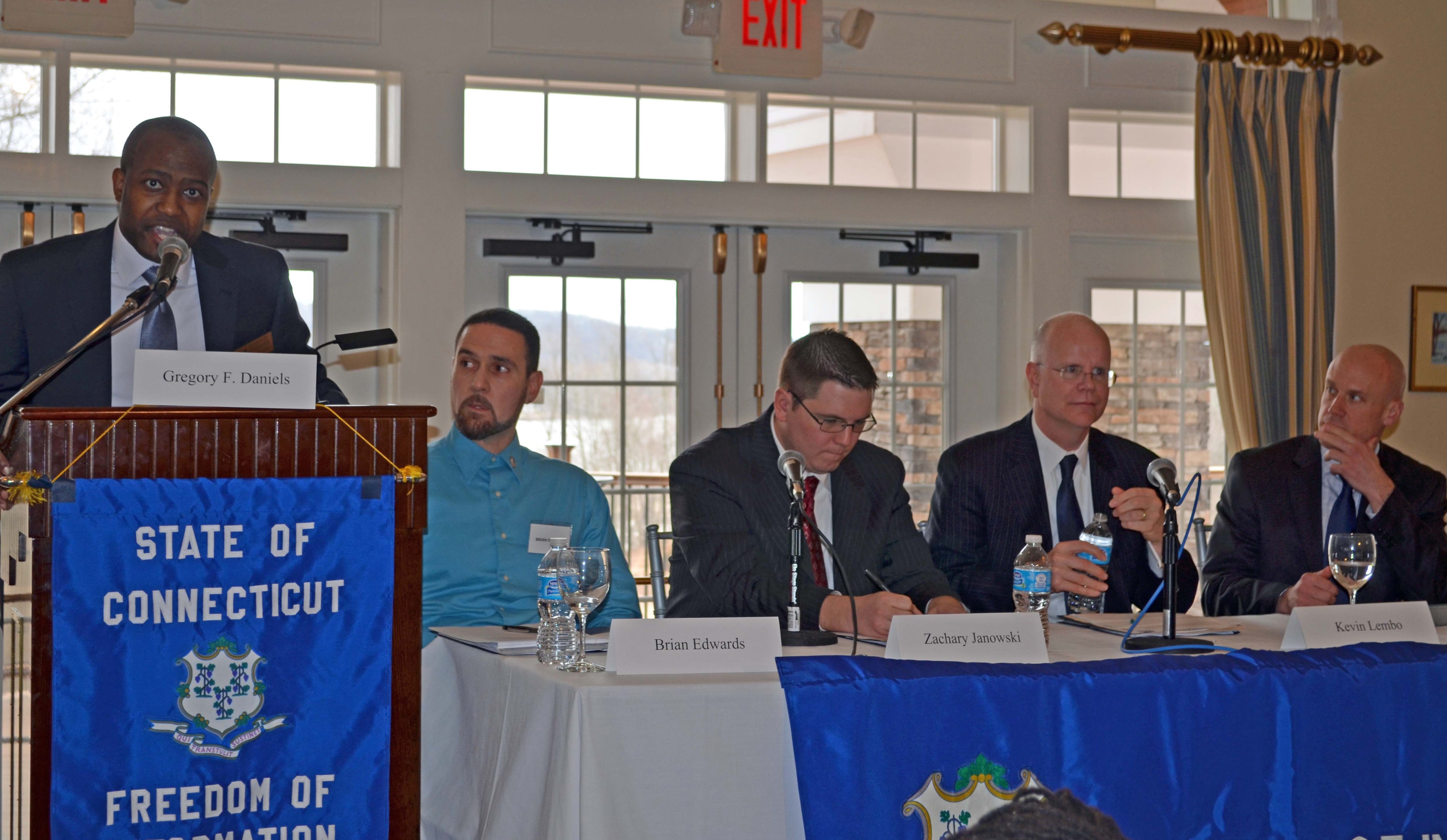 Gregory Daniels with panelists (from left) Brian Edwards, Zachary Janowski, Kevin Lembo, Jason Pufahl discussing 