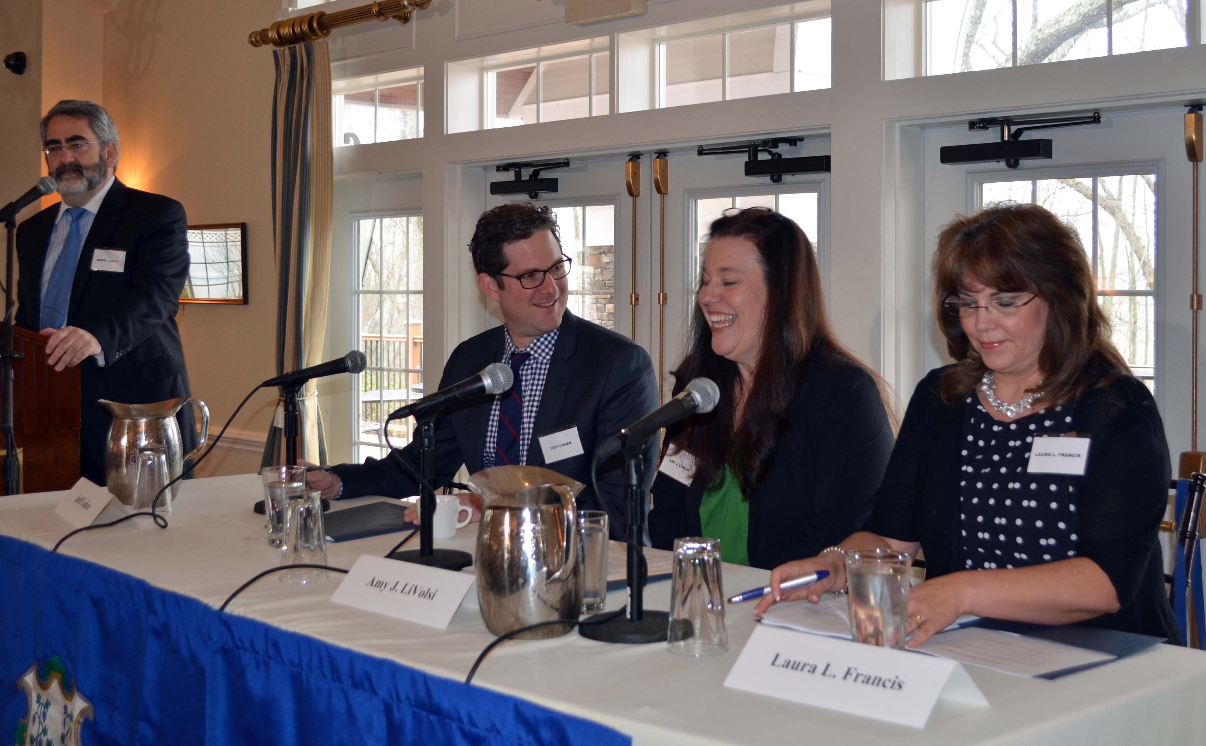 Daniel Klau with panelists (from left) Jeff Cohen, Laura L. Francis, Amy J. LiVolsi speaking on the panel topic “Open Meetings: