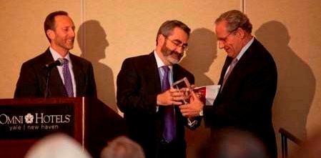 (l-r) Attorneys Aaron Bayer and Daniel Klau present the Walter Cronkite Award to author and journalist Bob Woodward, during the dinner celebrating the 35th anniversary of the FOIA, on November 18, 2010, in New Haven.