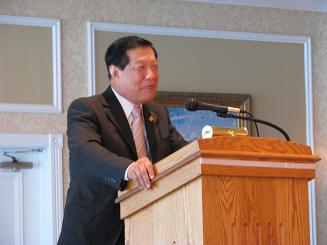 Keynote Speaker Dr. Henry Lee addresses attendees.