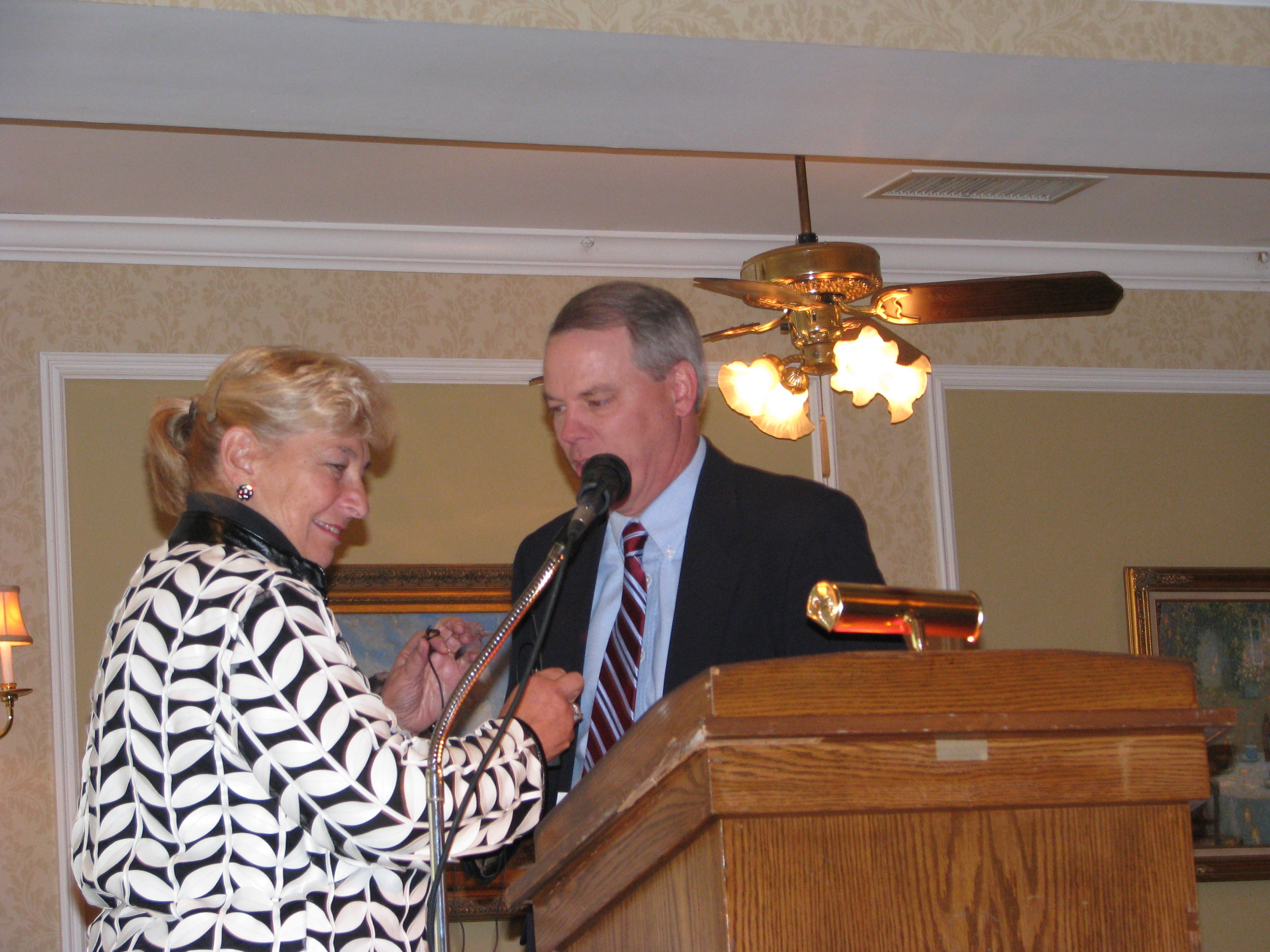 Peter Bucknall introduces speaker Dr. Joyce Saltman.