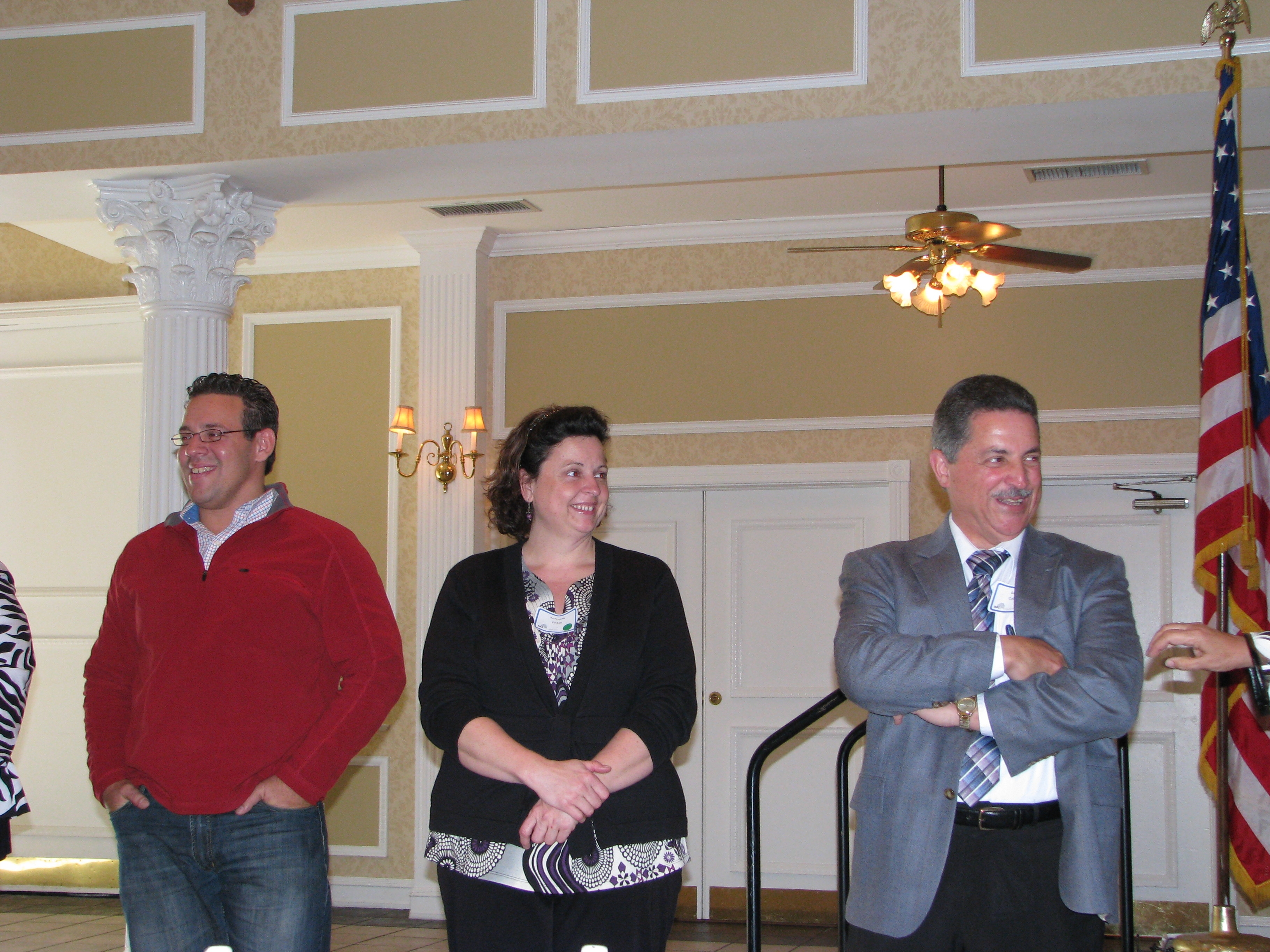 Three volunteers participate in Dr. Saltman's presentation.