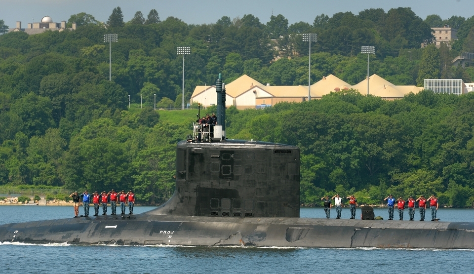 The Virginia-class, fast attack submarine USS California passes in review