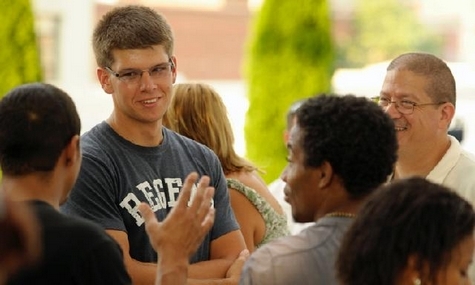 Evan Westbrook socializes with members of his father's church