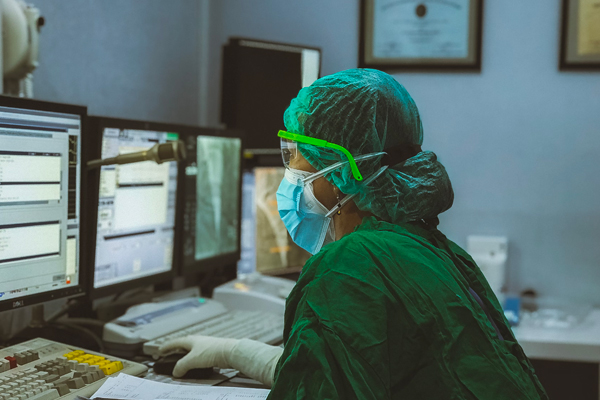Nurse using computer