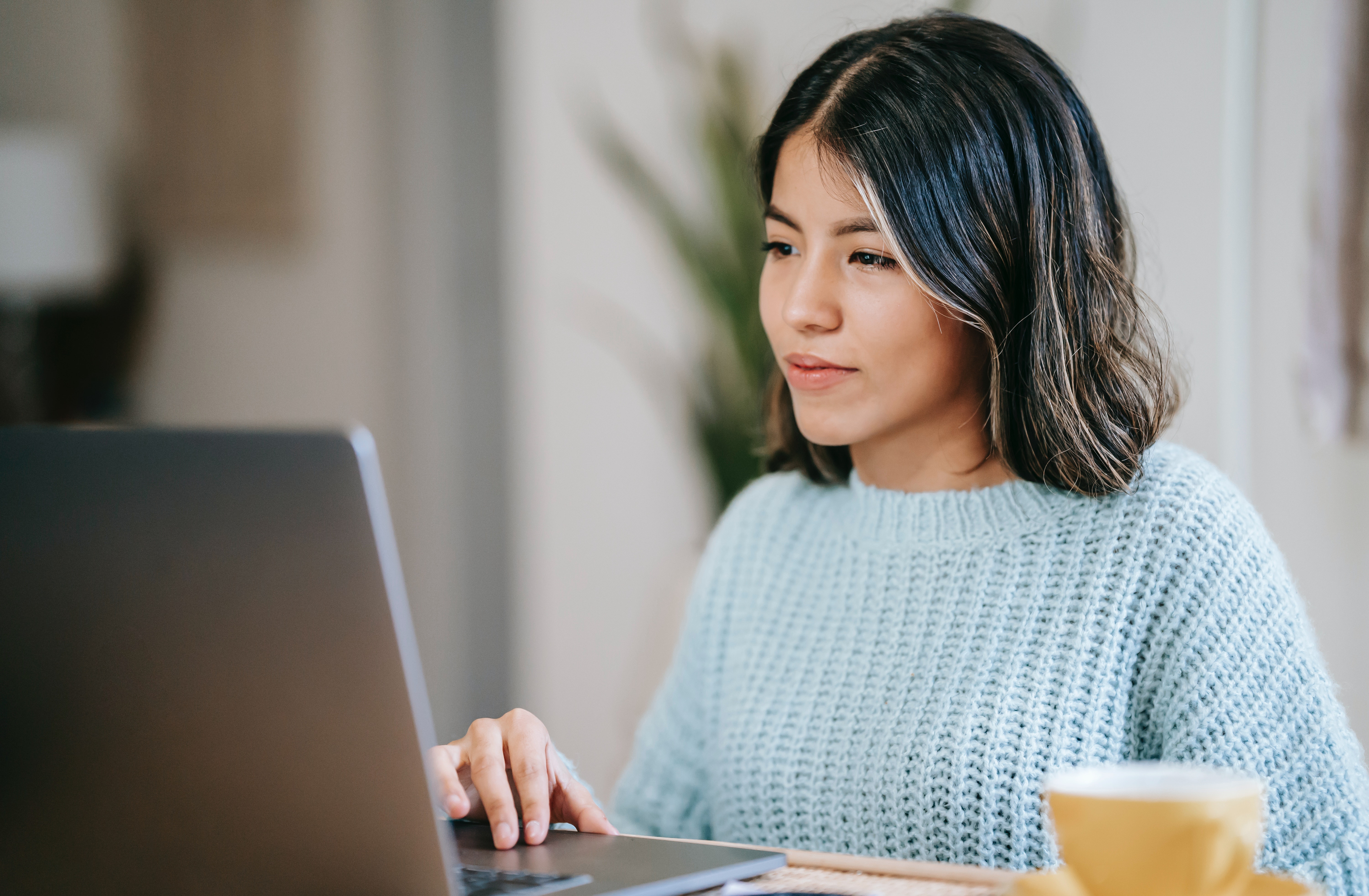 Woman working on laptop computer