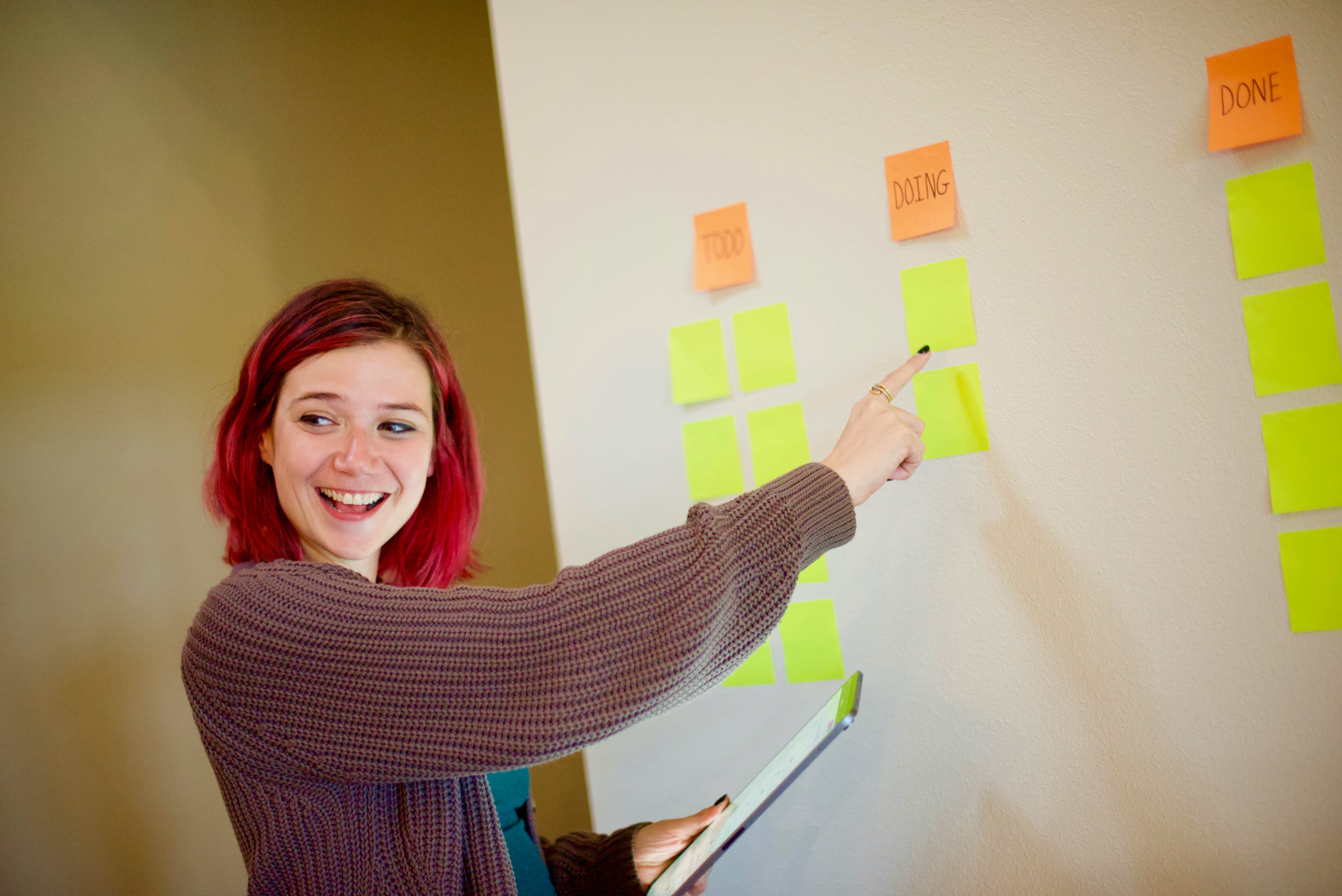 Young woman teacher at whiteboard
